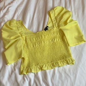 Yellow smocked puff sleeve top